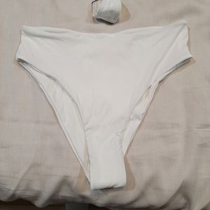 Two white bikini bottoms